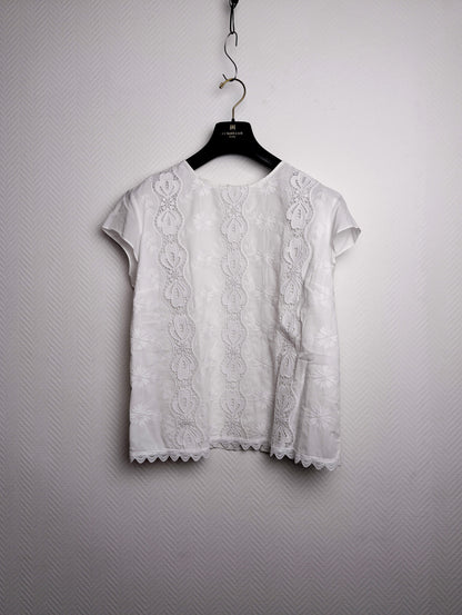 Back view of the white embroidered blouse