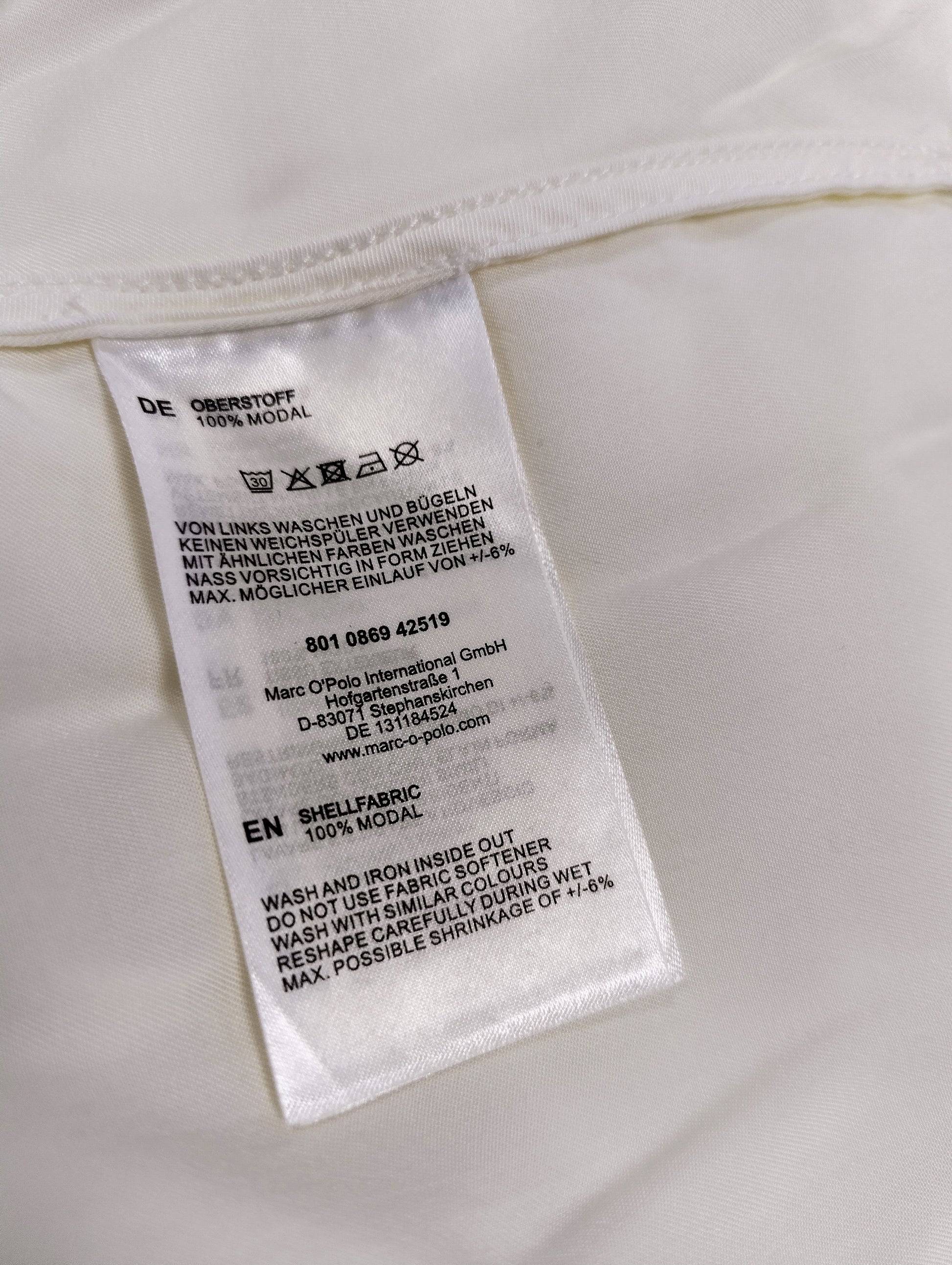 Care instructions and fabric details of the blouse