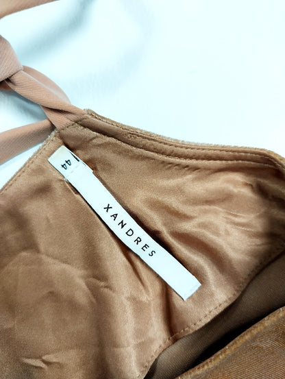 Label tag on the velvet top showing size and brand