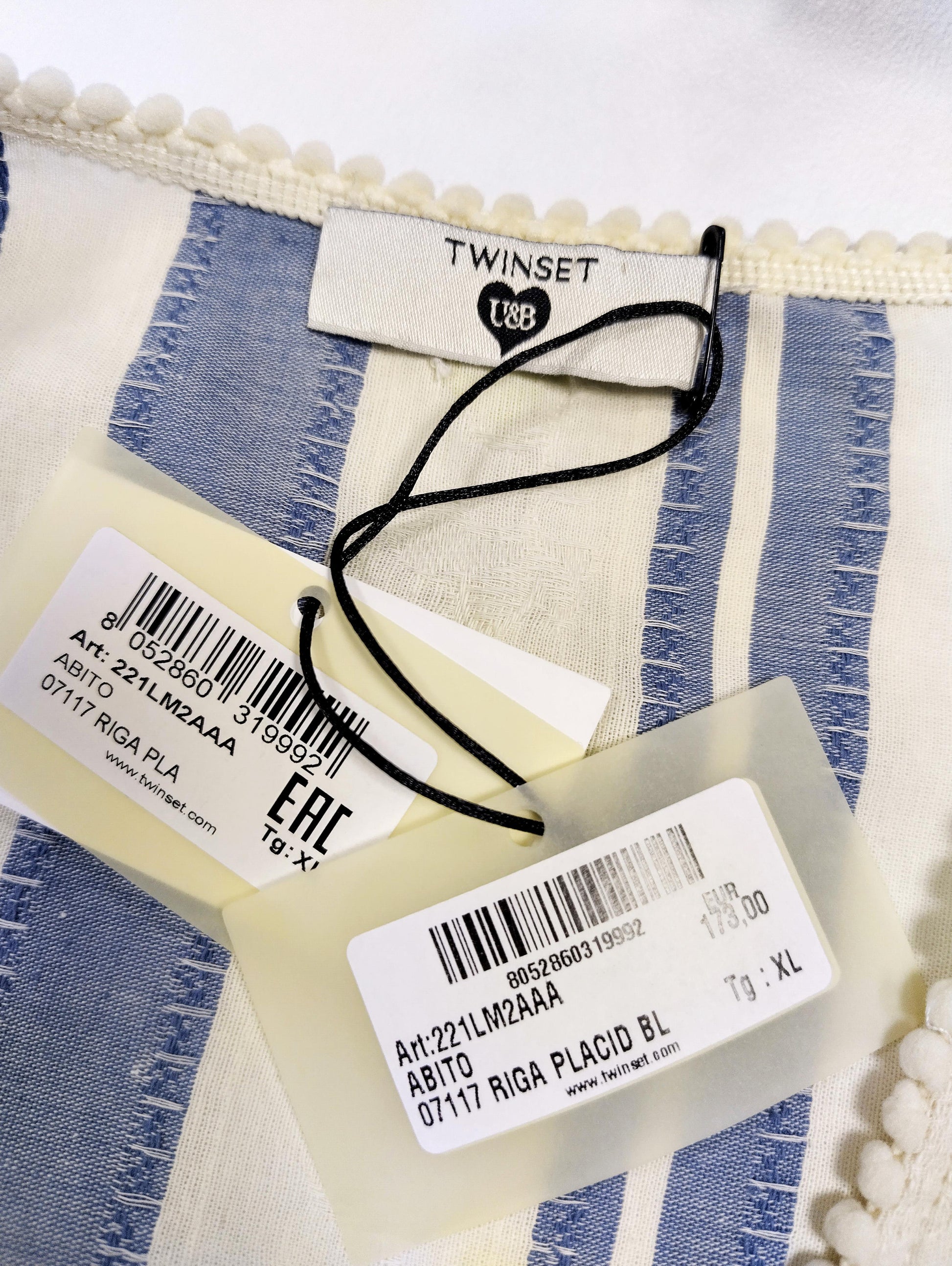 Close-up of the tags with size and fabric details