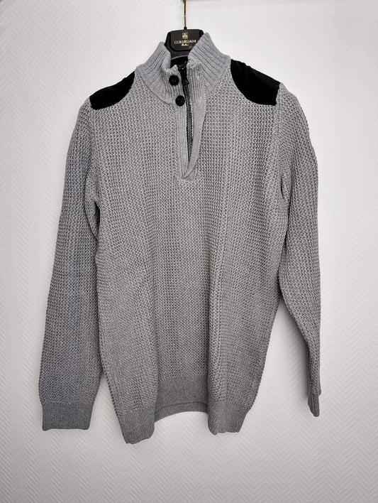 Front view of gray sweater with black shoulder accents