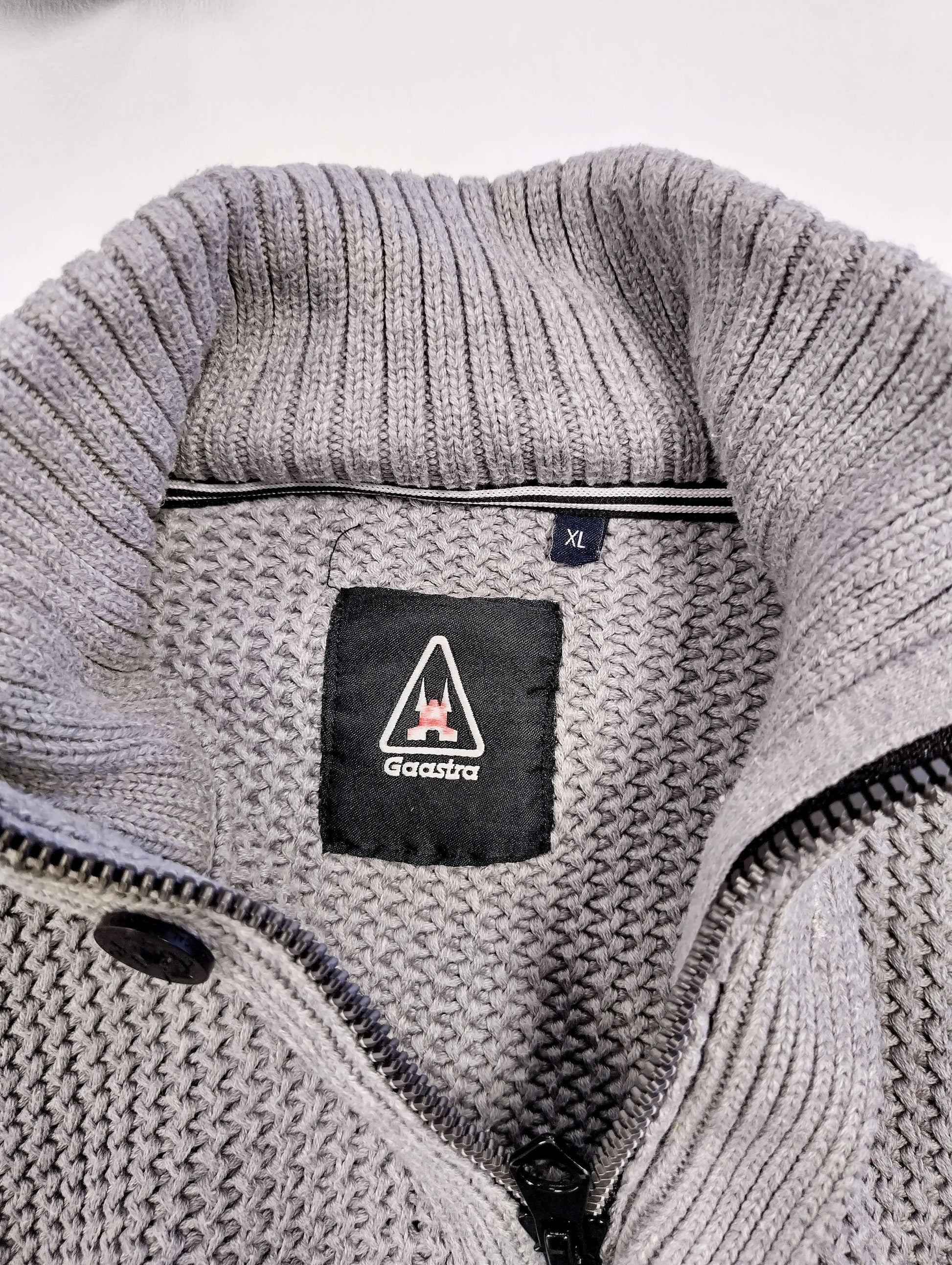Close-up of the sweater's collar and label inside
