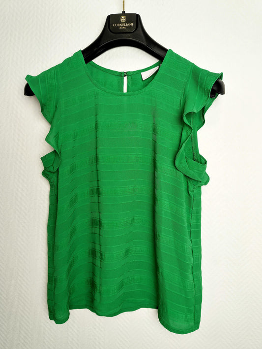 Front view of the green ruffled top