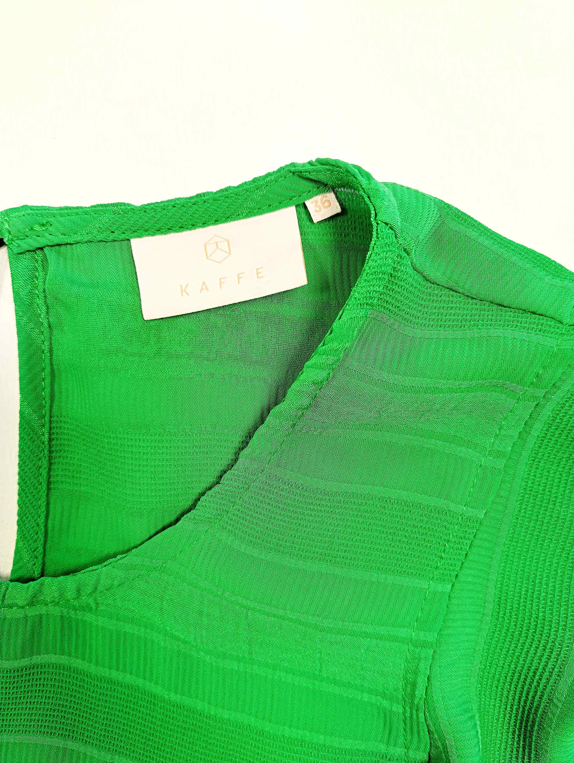 Close-up of the neckline and label