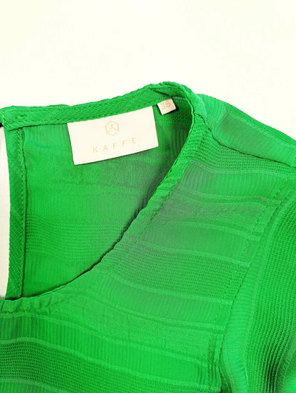 Close-up of the neckline and label