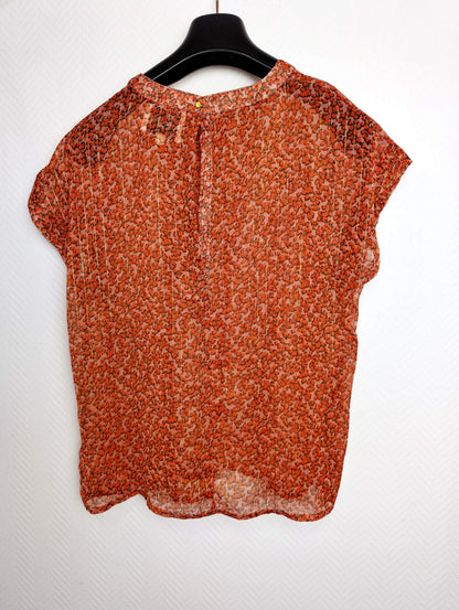 Alternate back view of the floral top