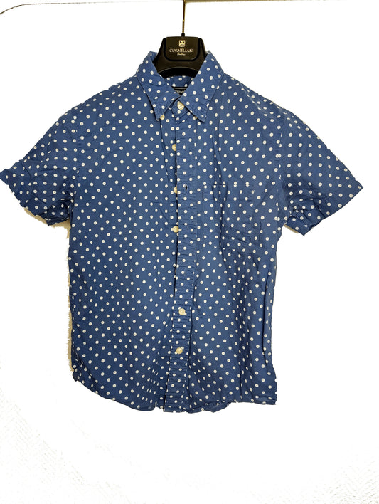 Front view of a blue polka dot shirt
