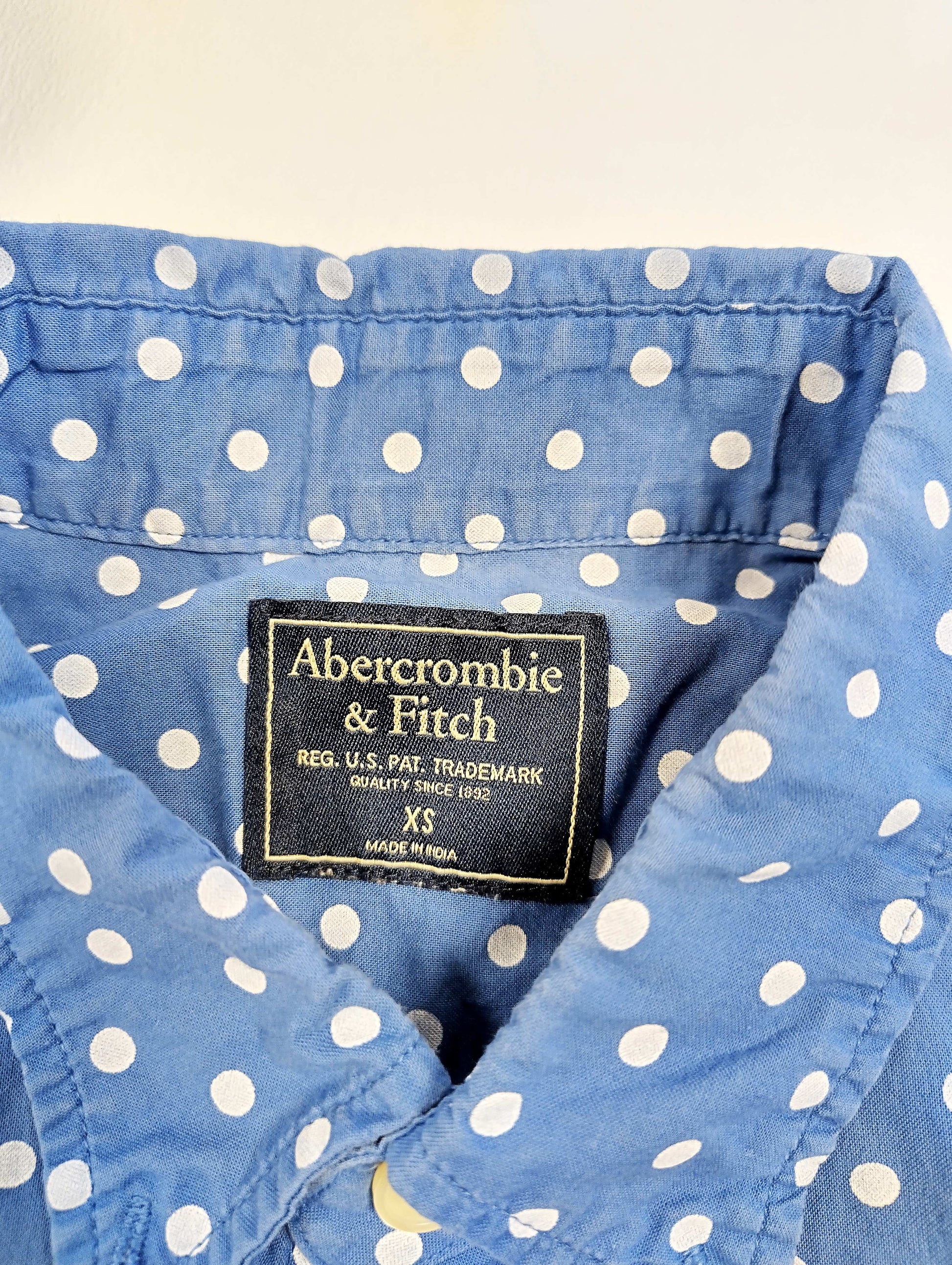 Close-up of the shirt's tag showing Abercrombie & Fitch