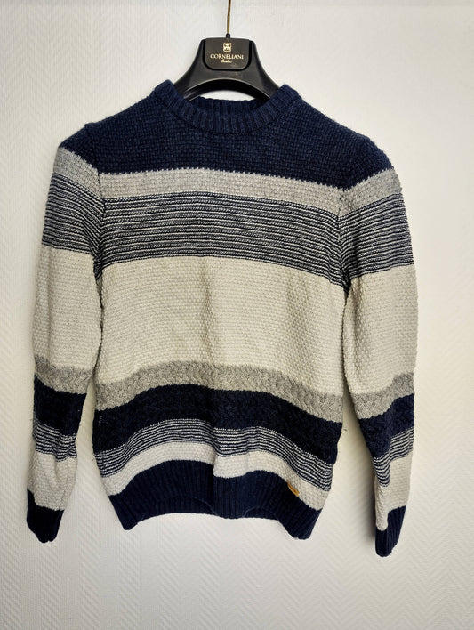 Front view of the striped knit sweater
