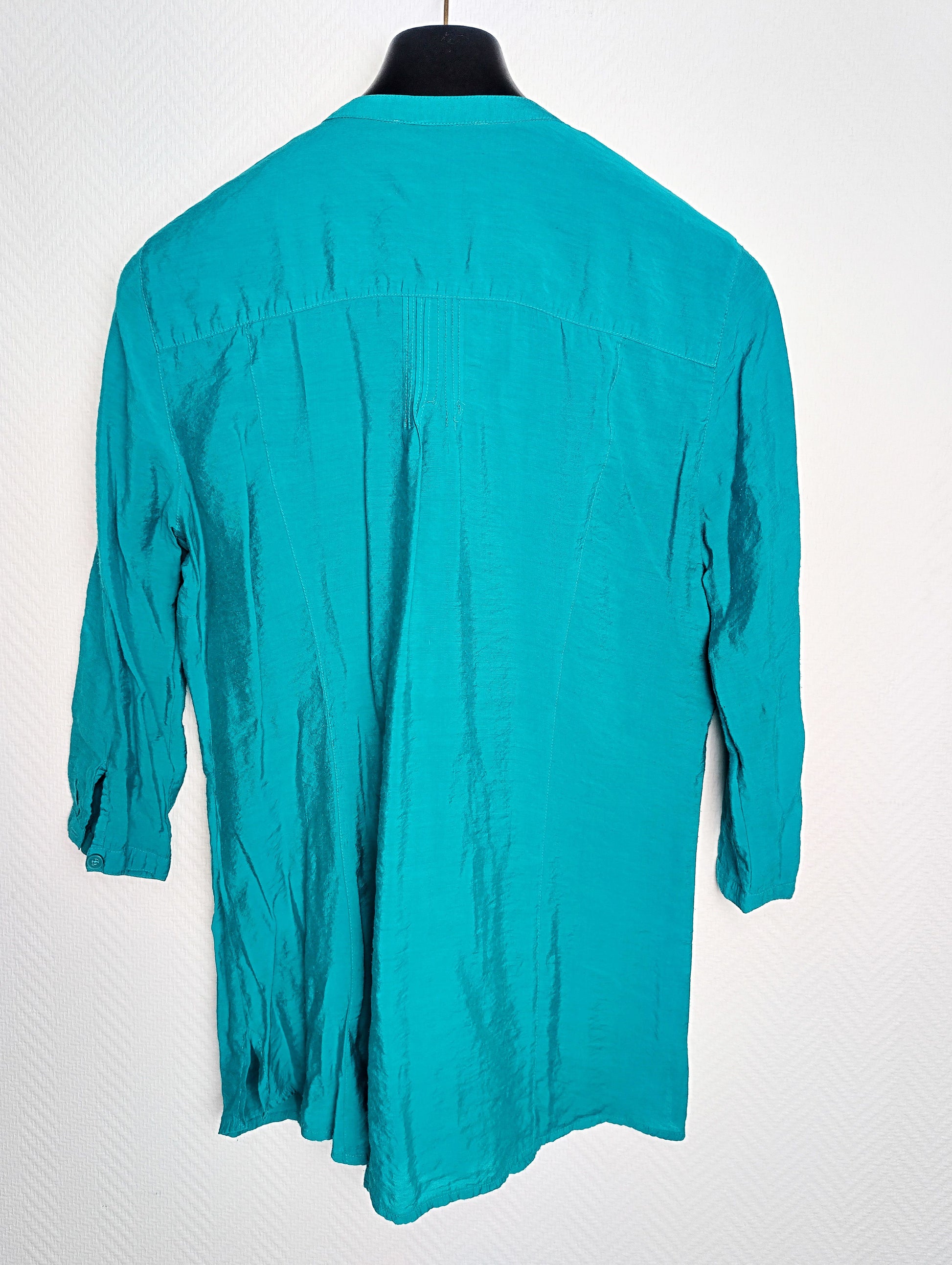 Teal blouse back view