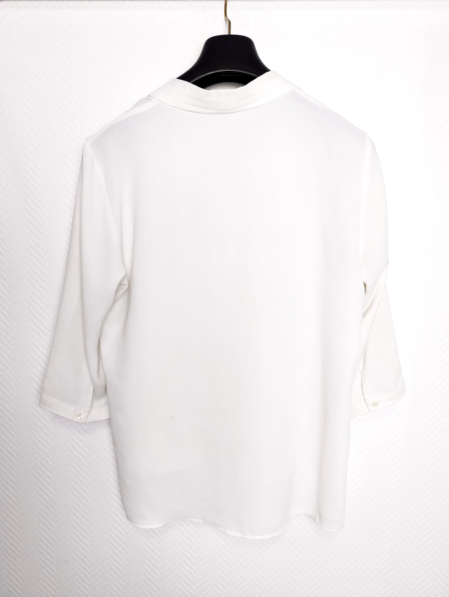 Back view of the white blouse