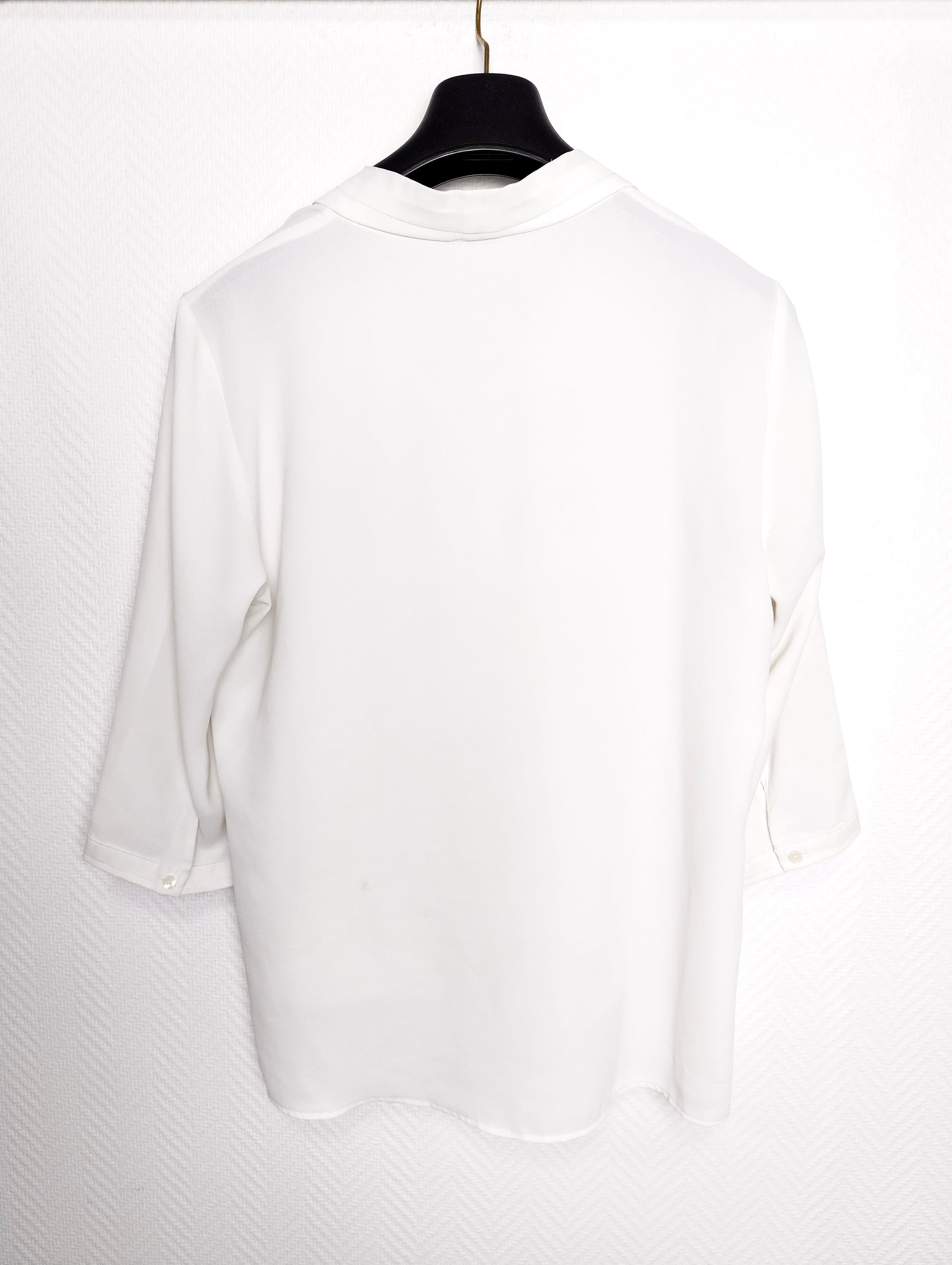 Back view of the white blouse