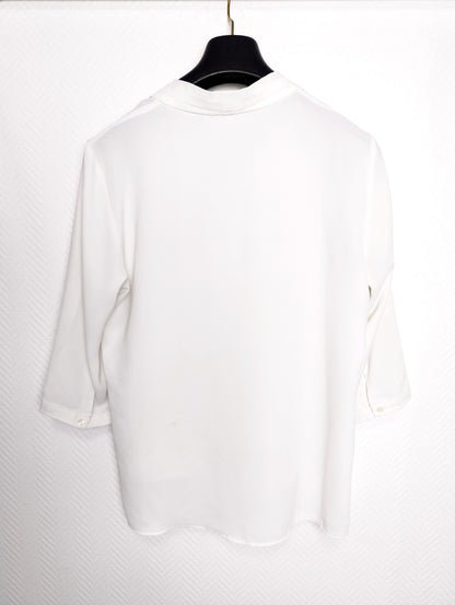 Back view of the white blouse