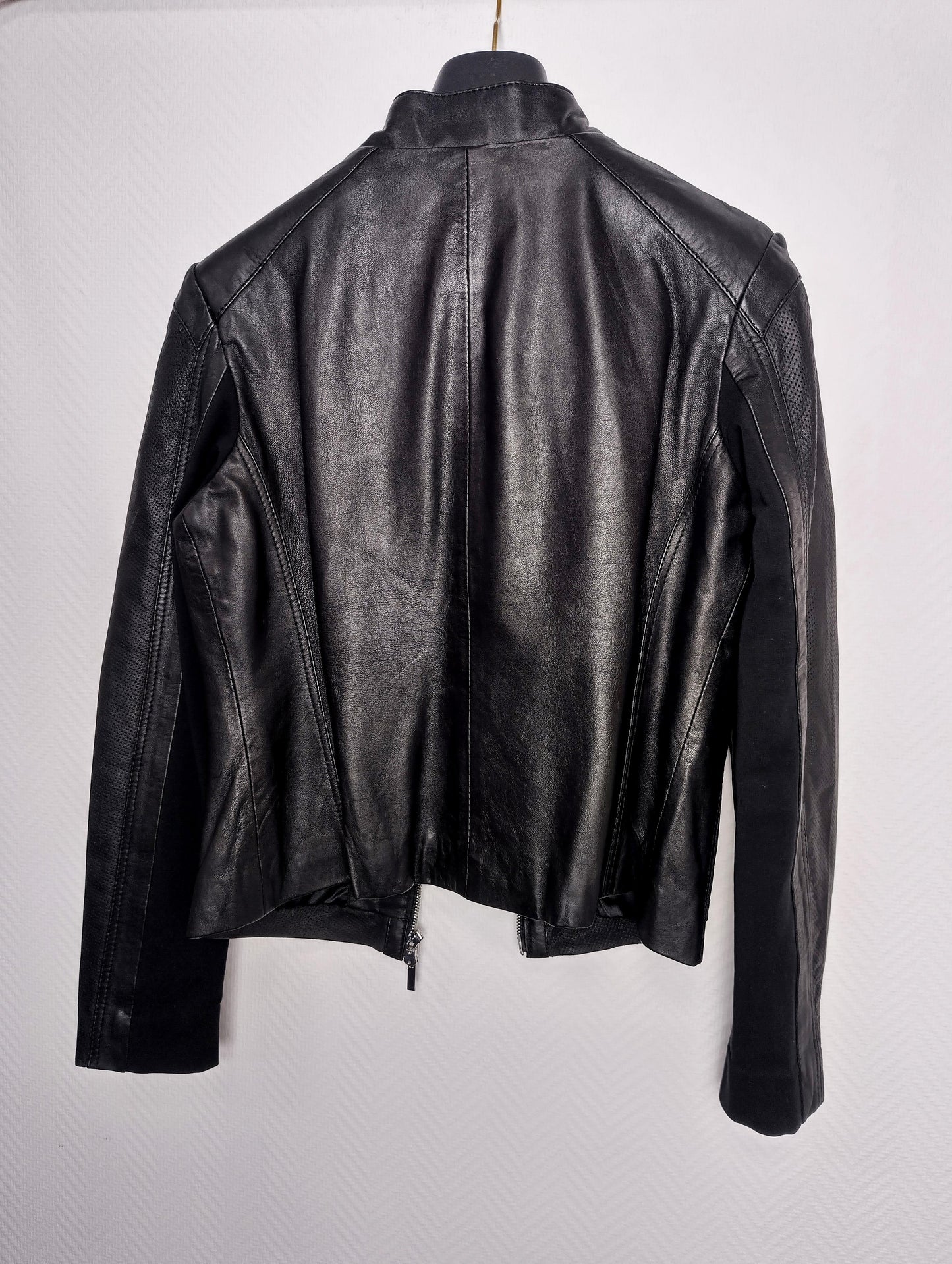 Back view of black leather jacket