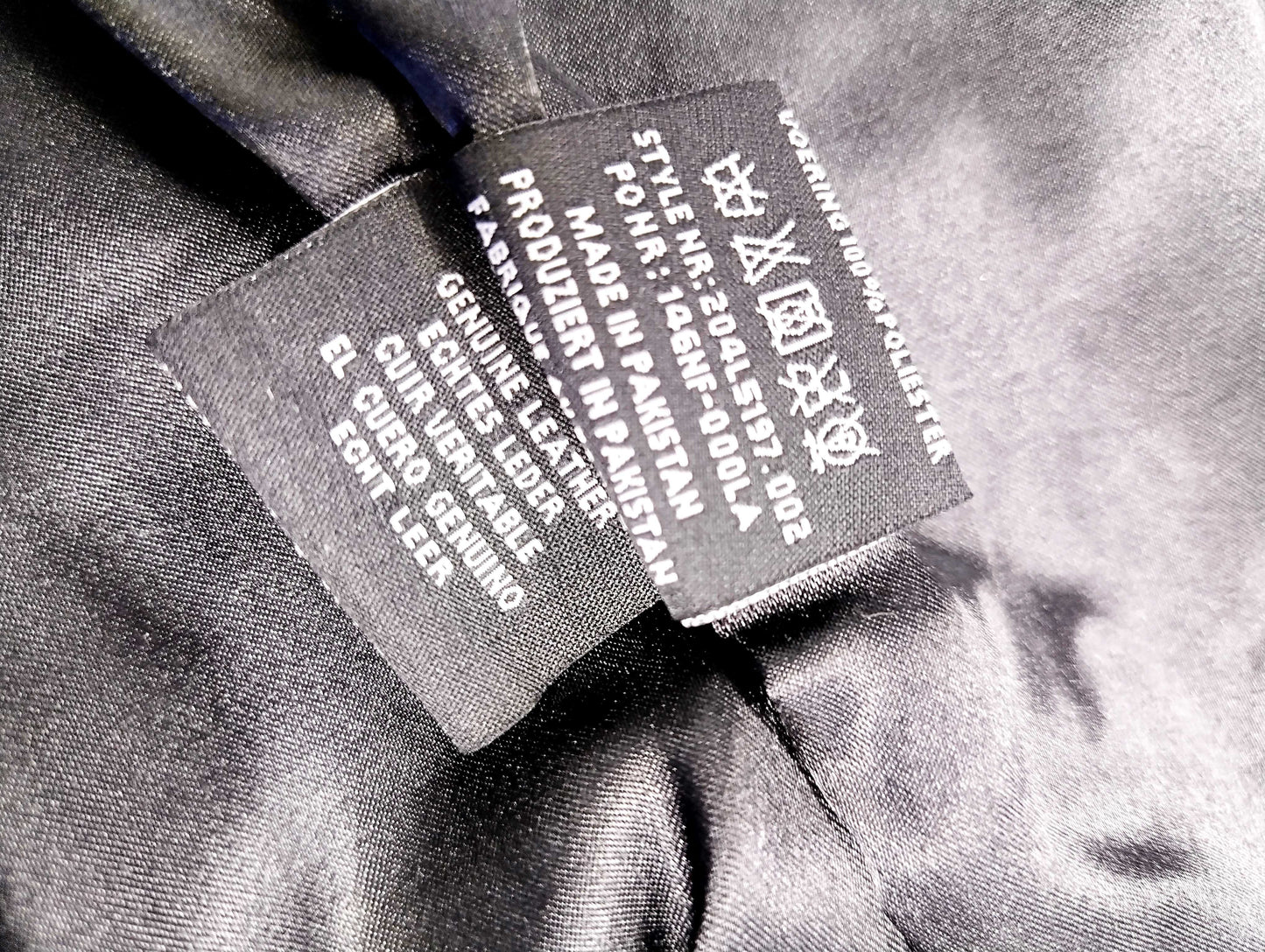 Tags inside the jacket fabric