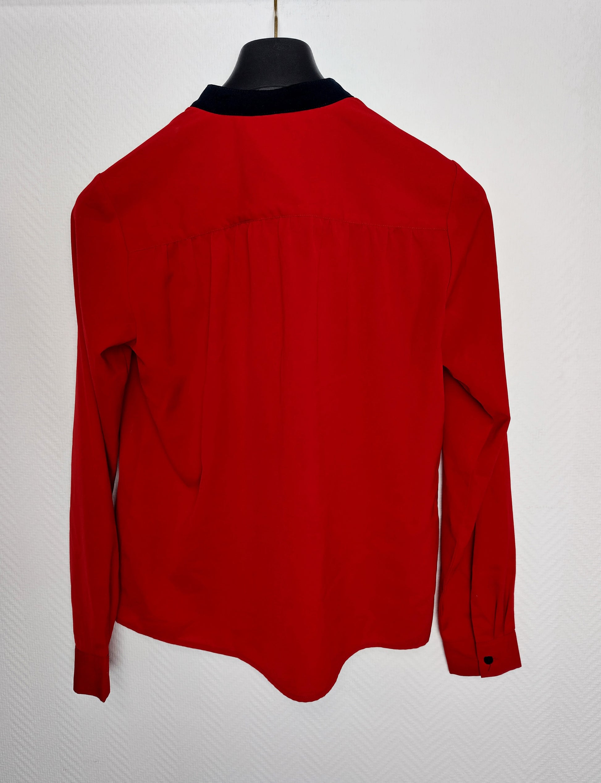 Back view of the red blouse