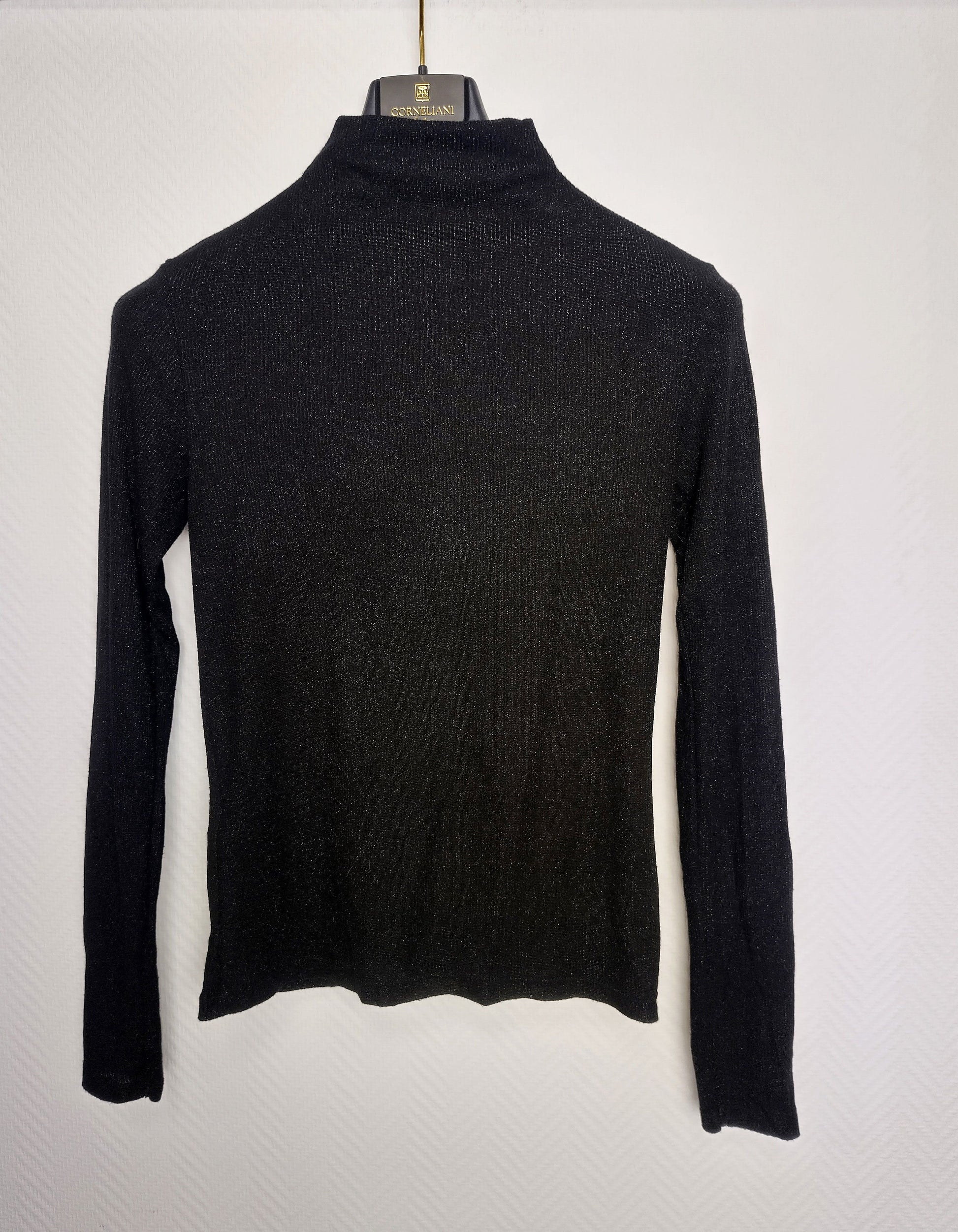 Back view of black long sleeve top
