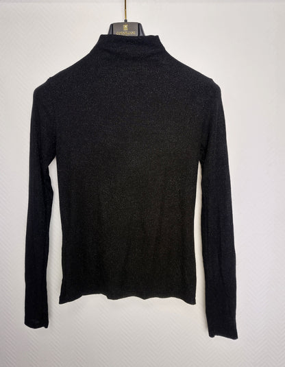 Back view of black long sleeve top