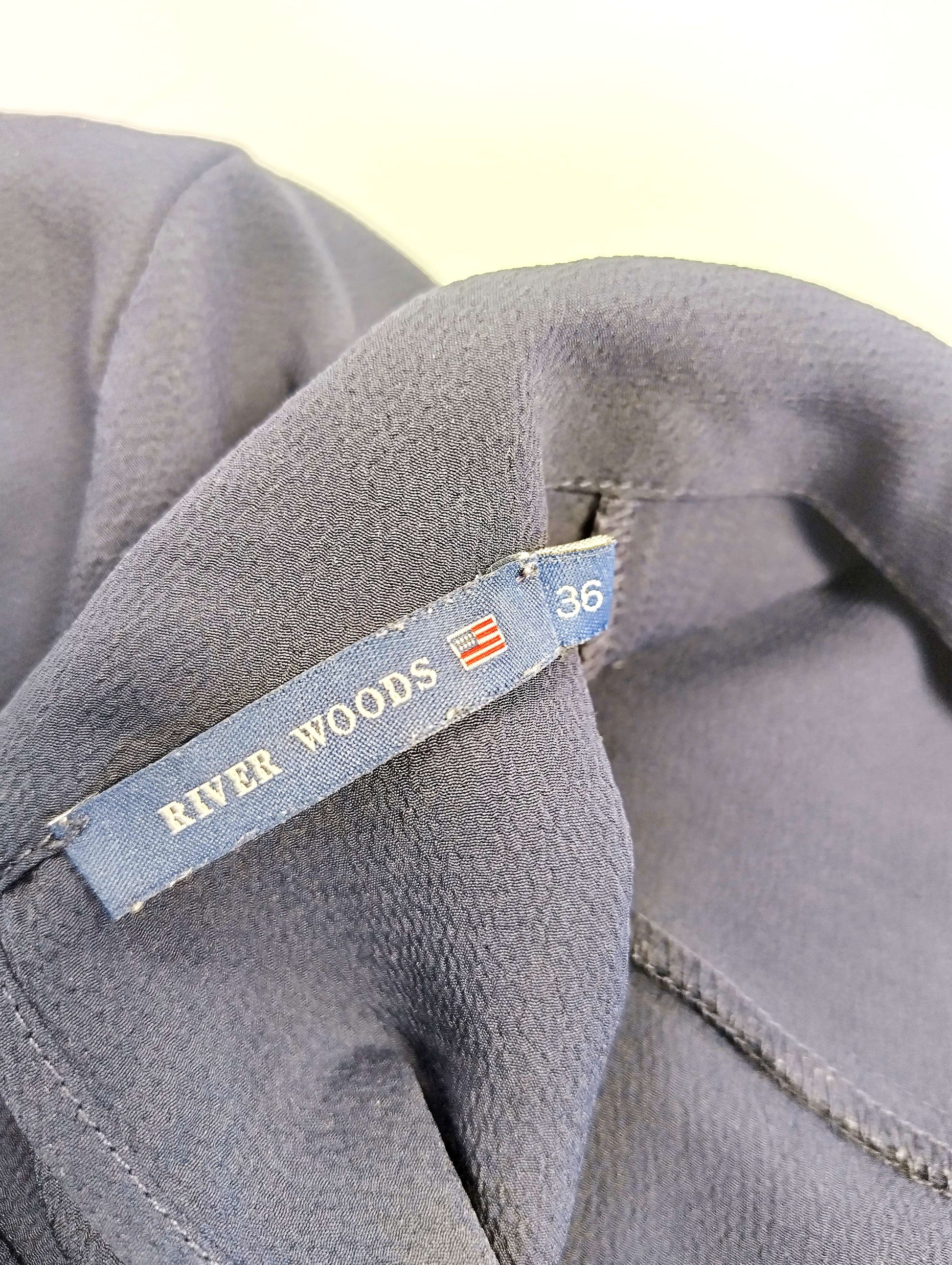 Close-up of label showing River Woods brand