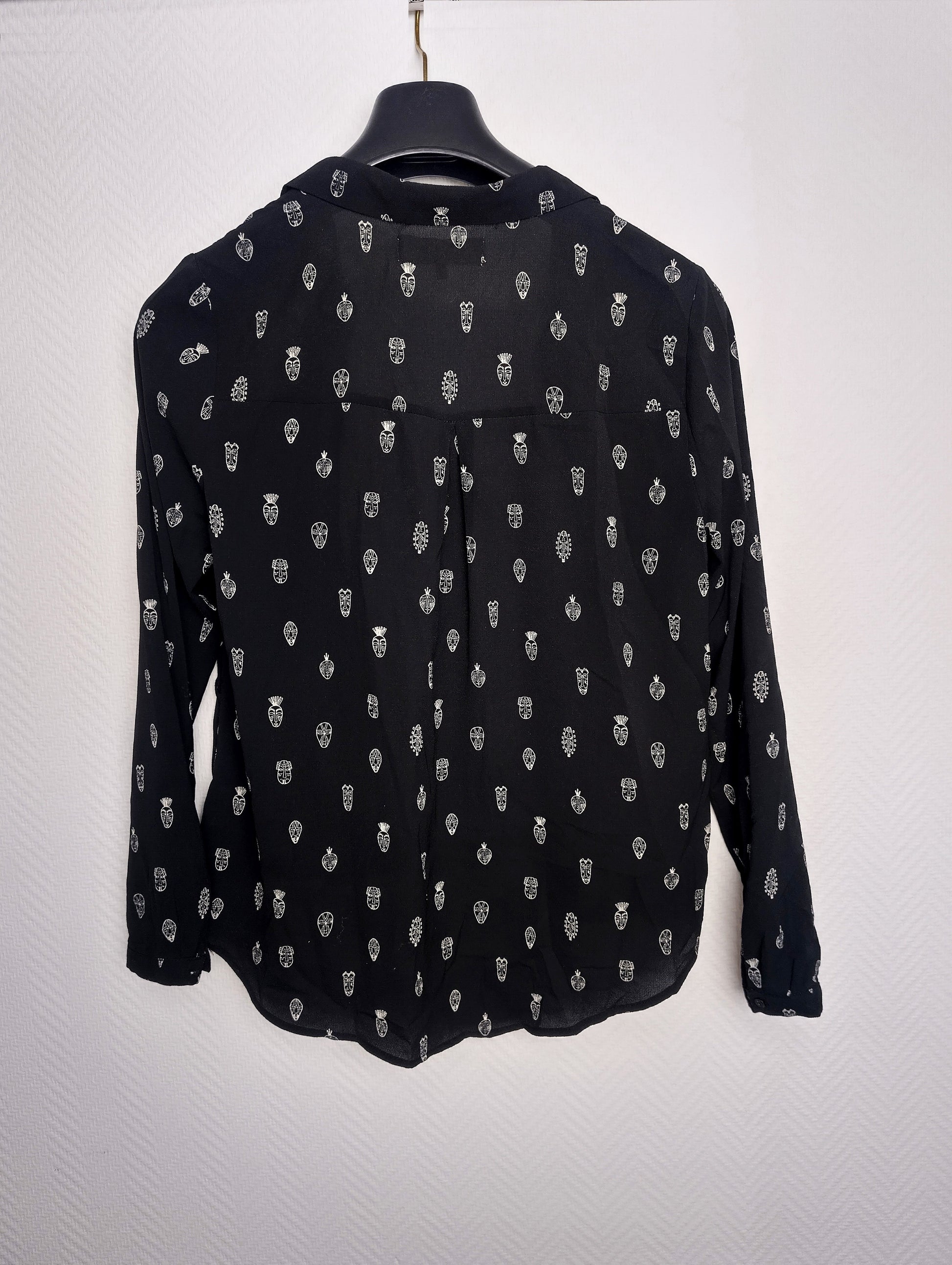 Back view of Revelation blouse
