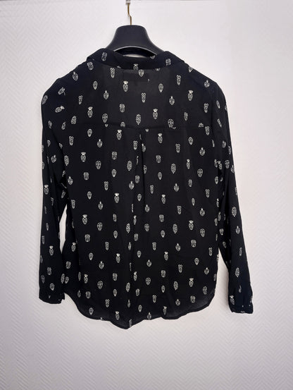 Back view of Revelation blouse