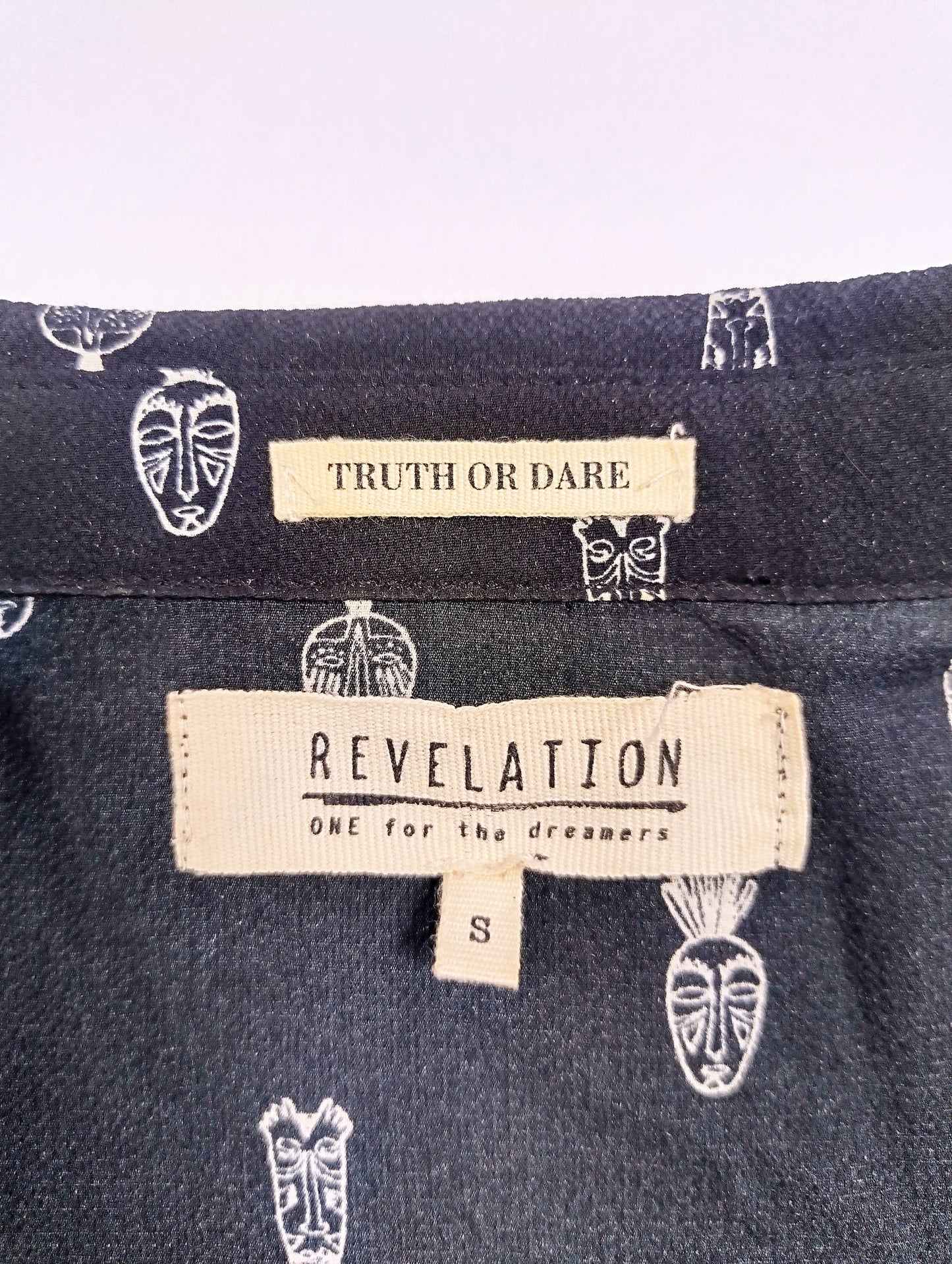 Label of Revelation blouse