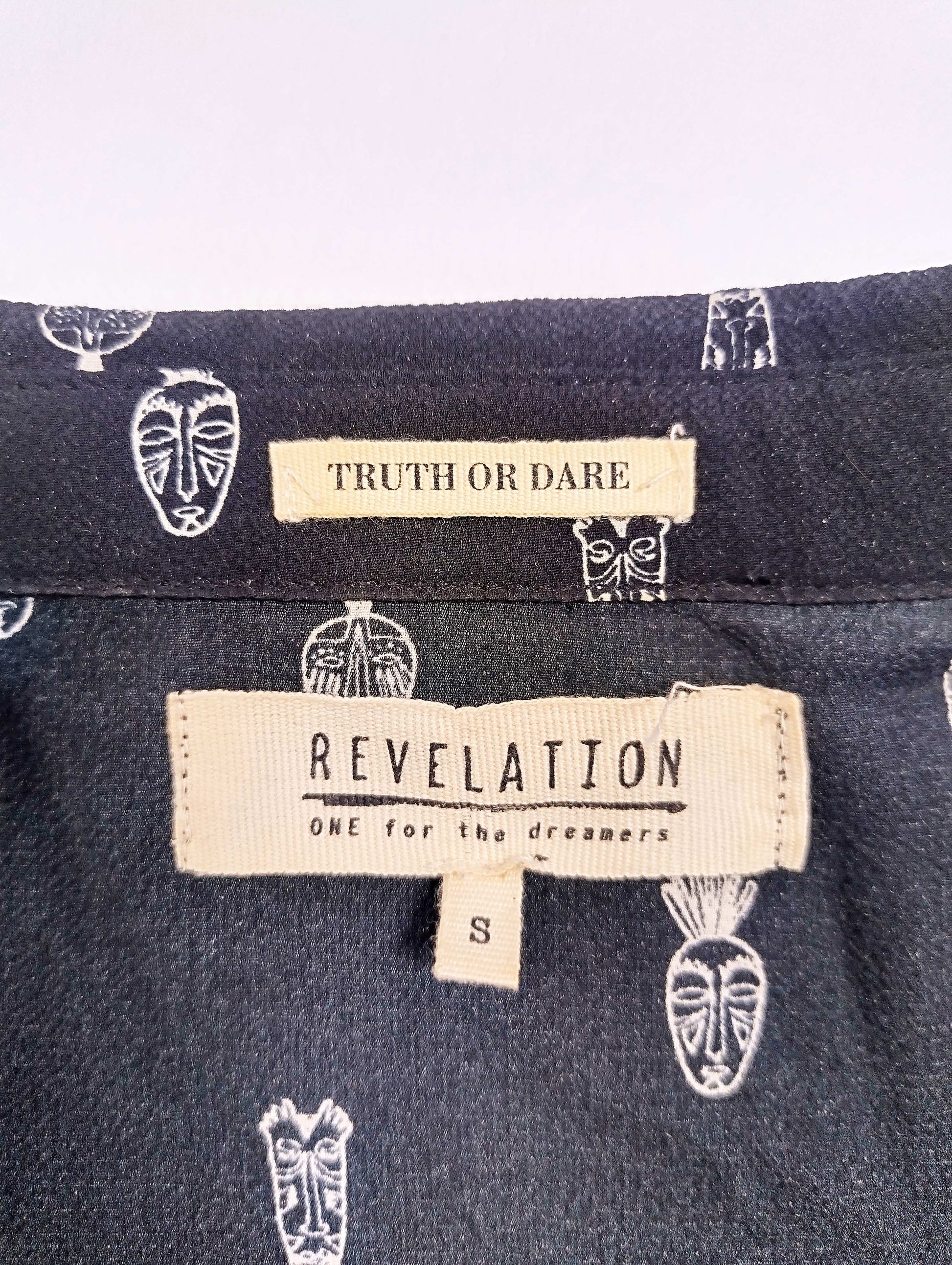 Label of Revelation blouse