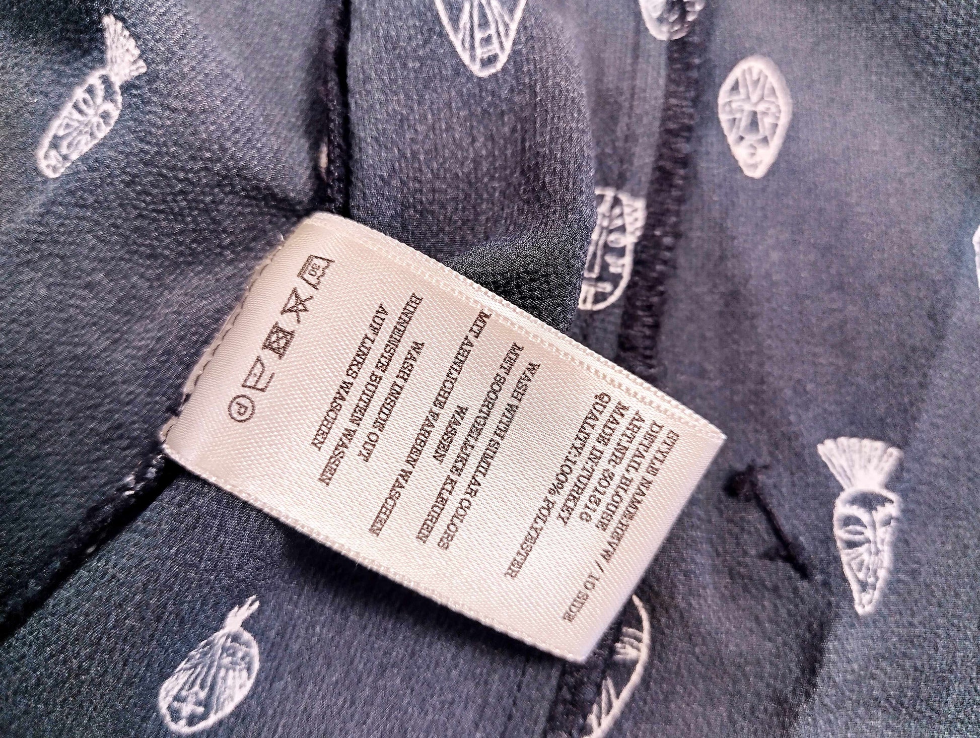 Care label of Revelation blouse