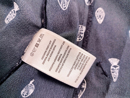 Care label of Revelation blouse