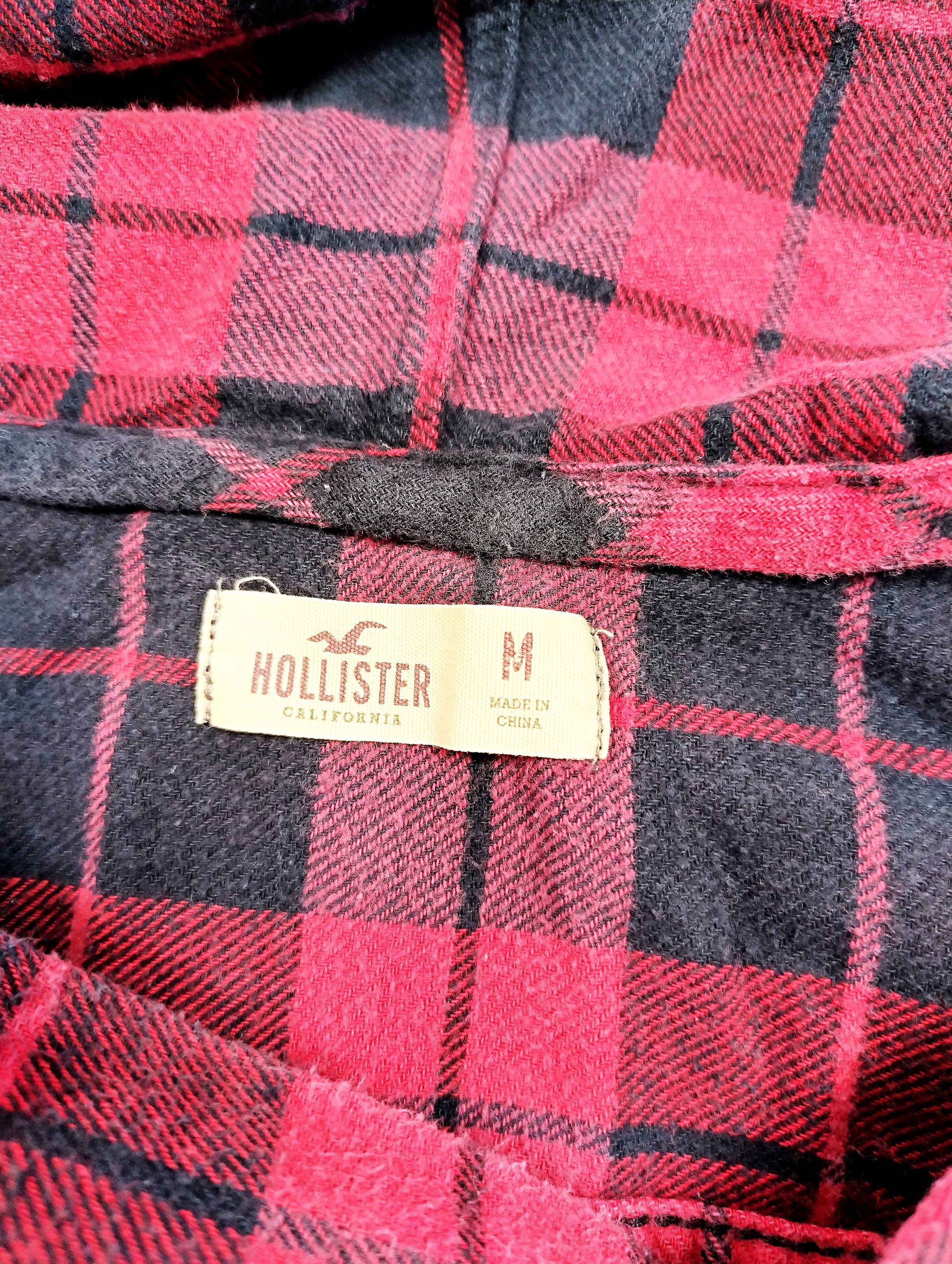 Close-up of Hollister label and size tag