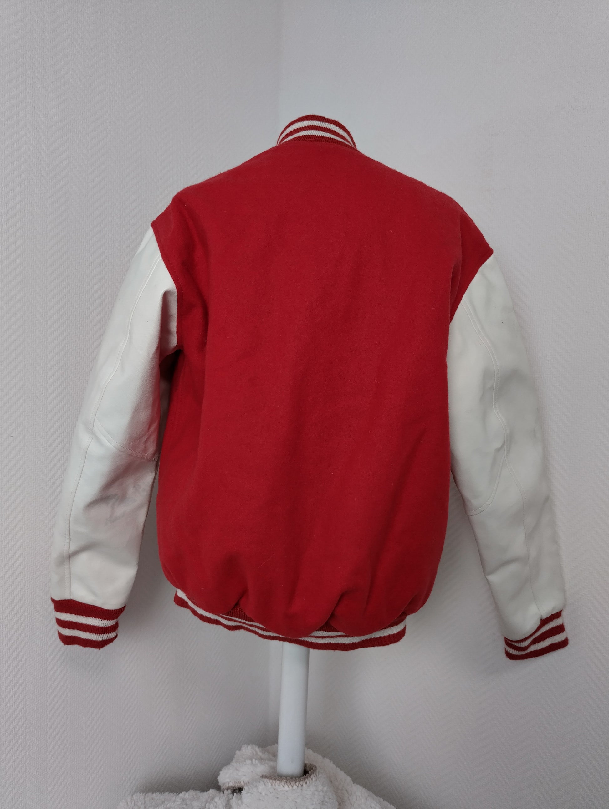 Red and white varsity jacket back view