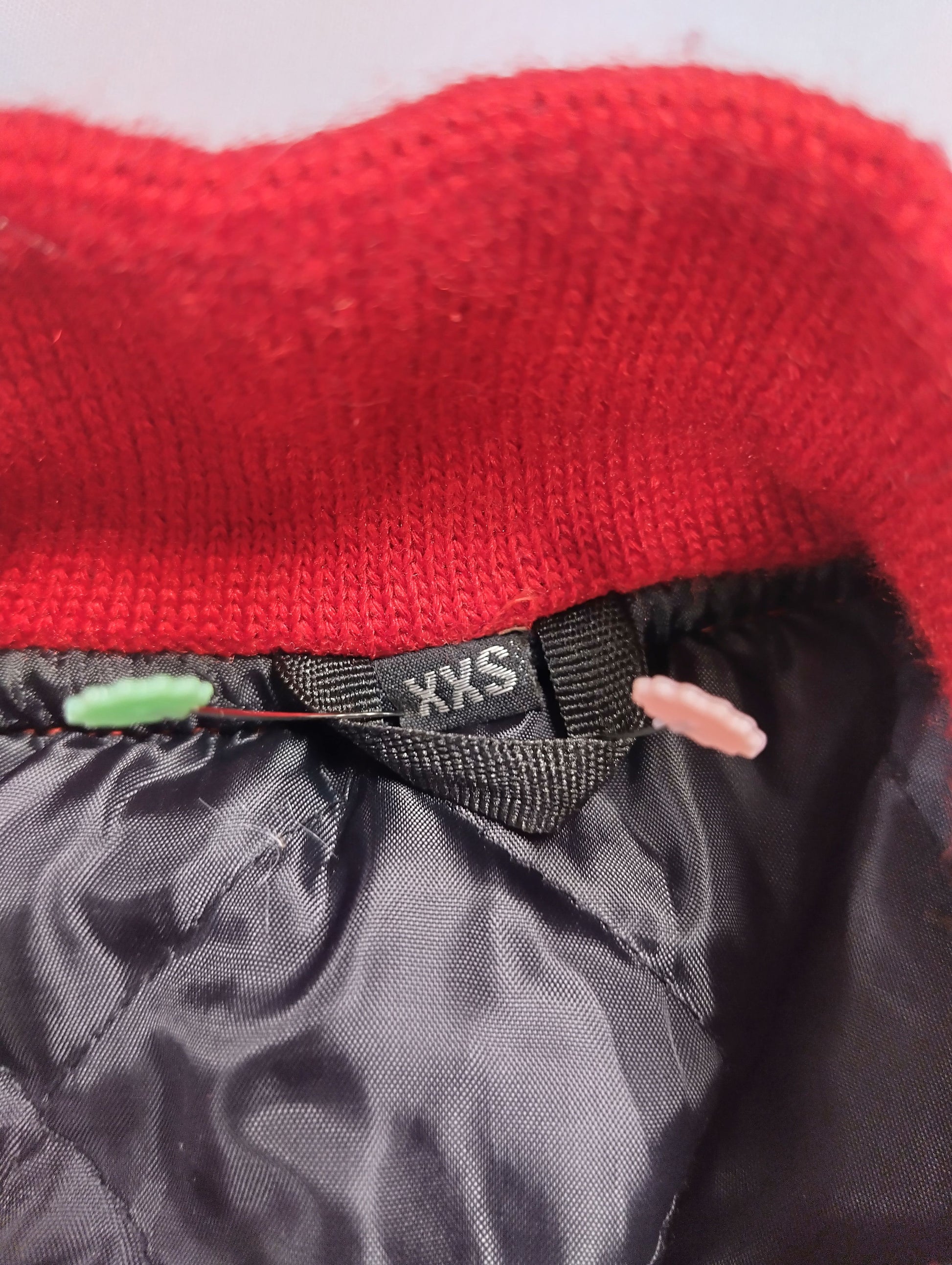 Size tag of the varsity jacket