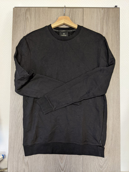Another angle of black sweater hanging