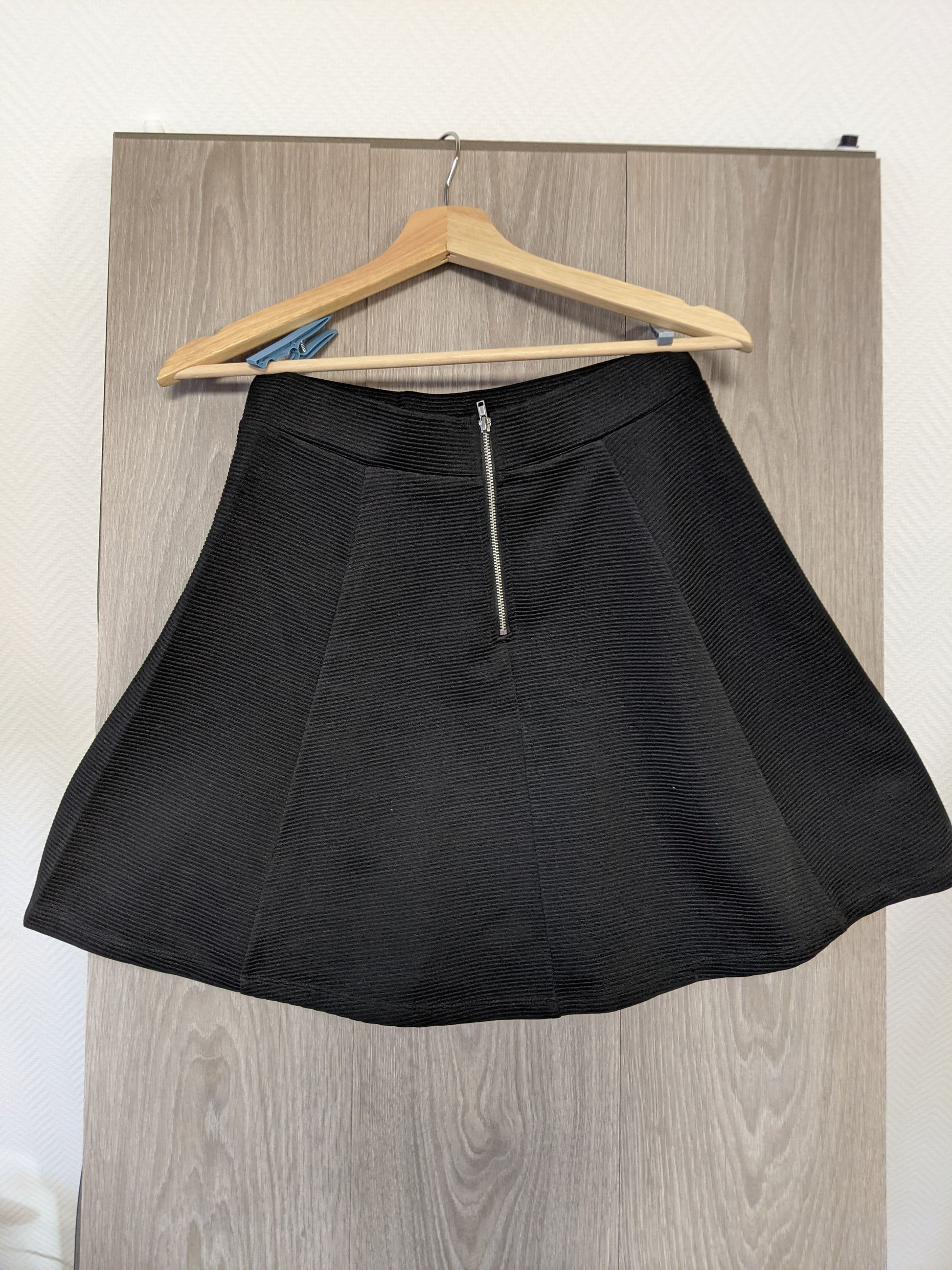 Black flared skirt back view