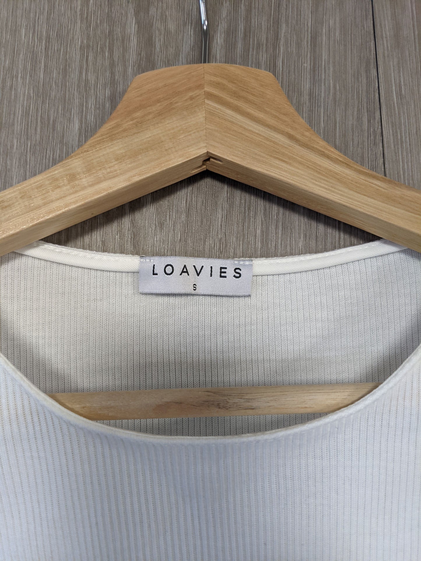 Close-up of Loavies label on the tank top