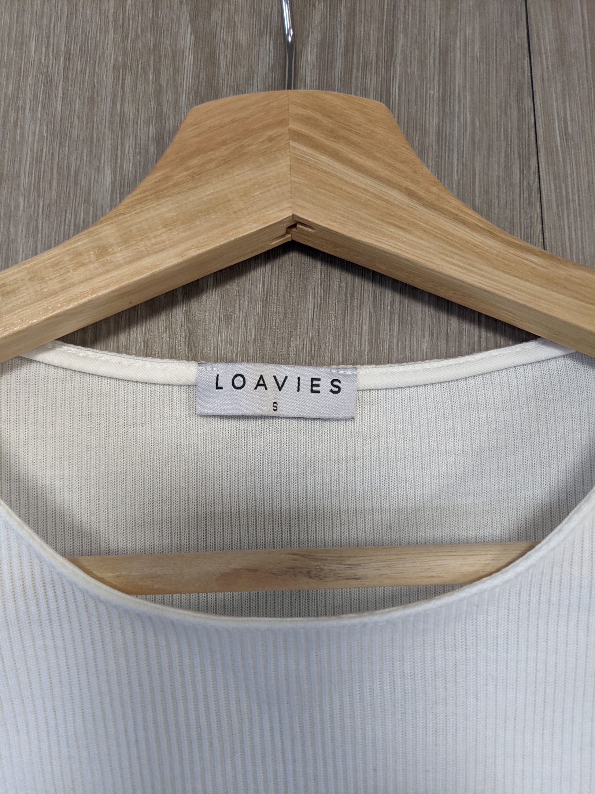 Close-up of Loavies label on the tank top