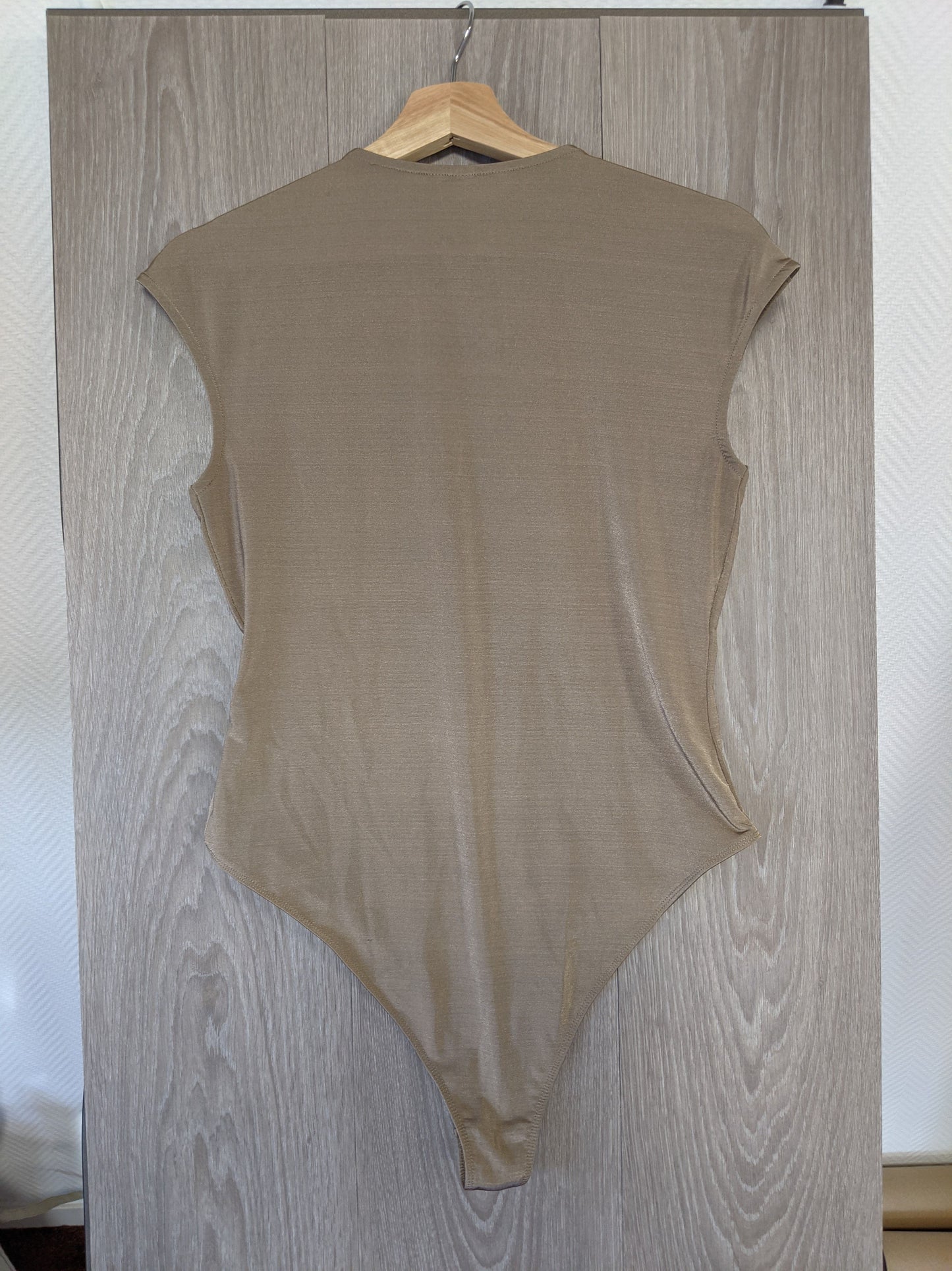 Back view of brown bodysuit