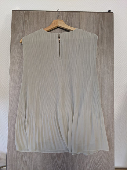 Light green pleated top back view