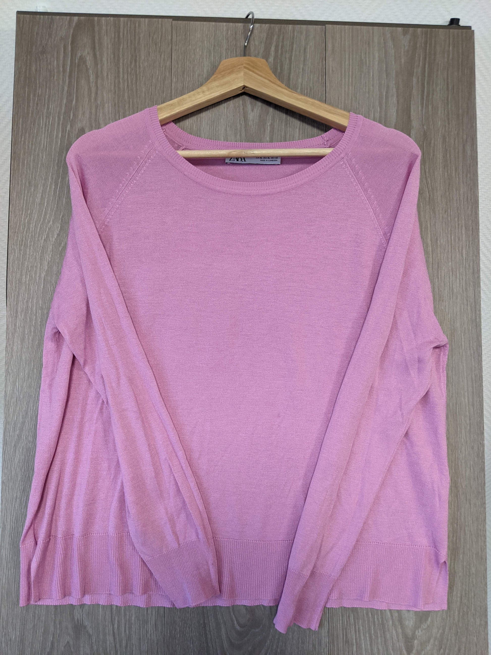 Side view of the pink sweater