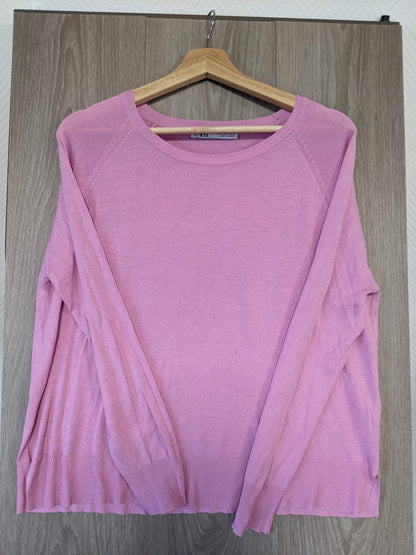 Side view of the pink sweater