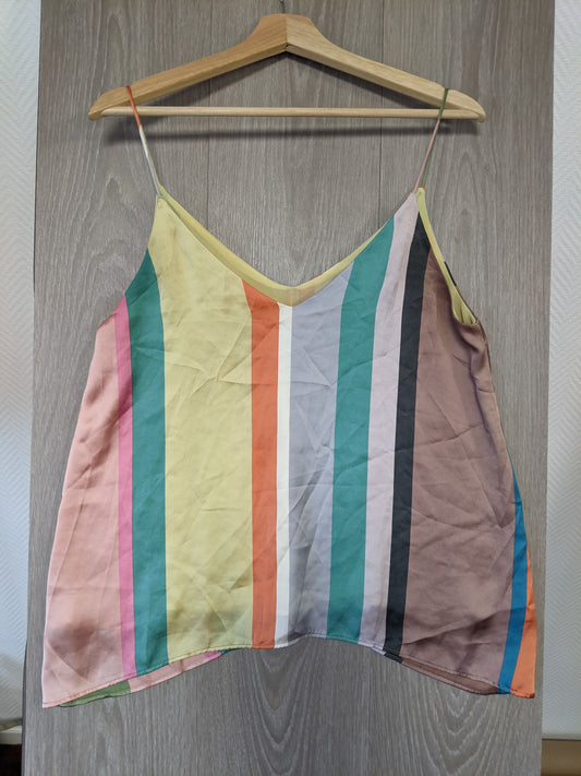 Colorful striped top on hanger view