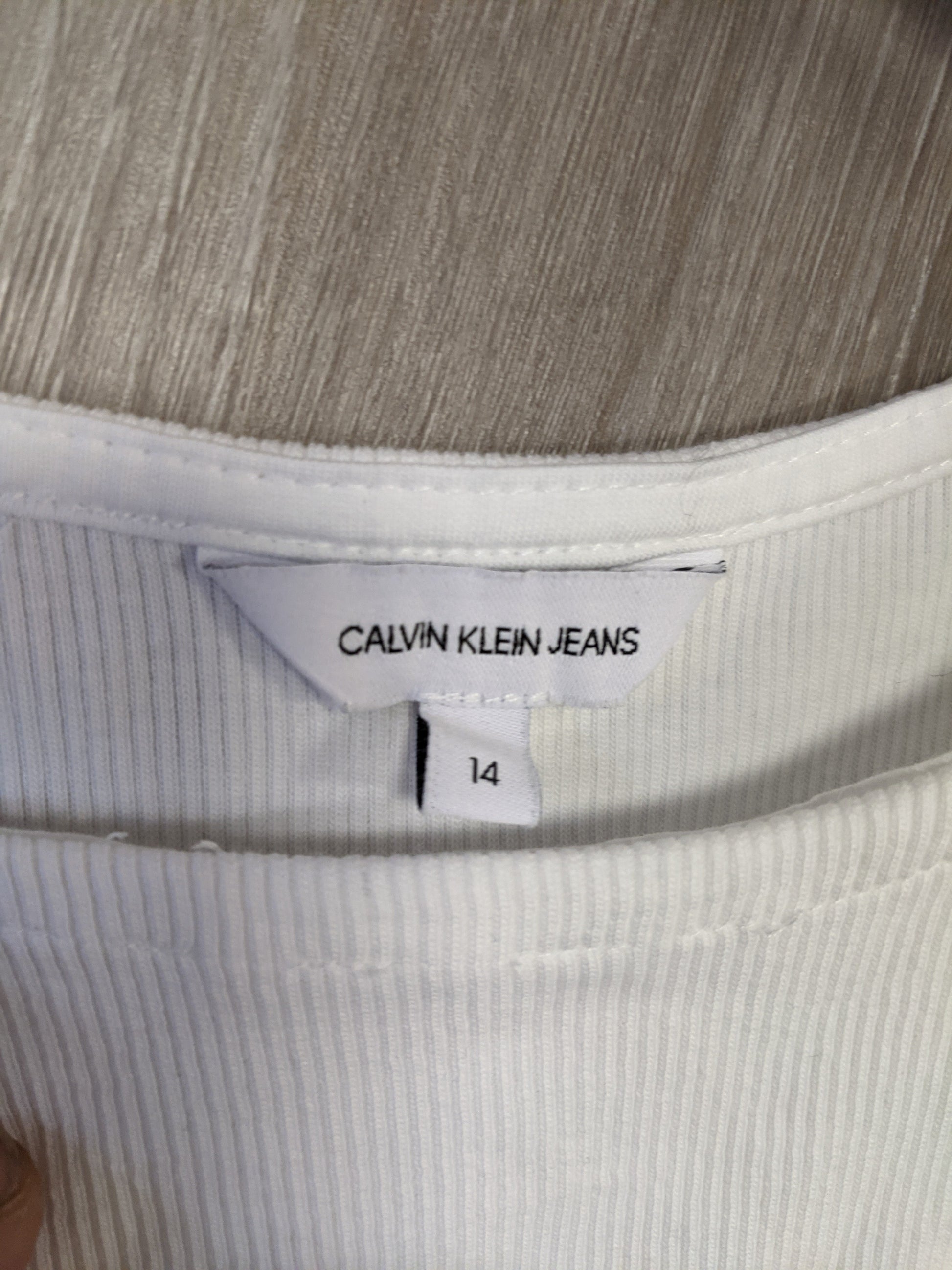 Label showing Calvin Klein Jeans and size 14