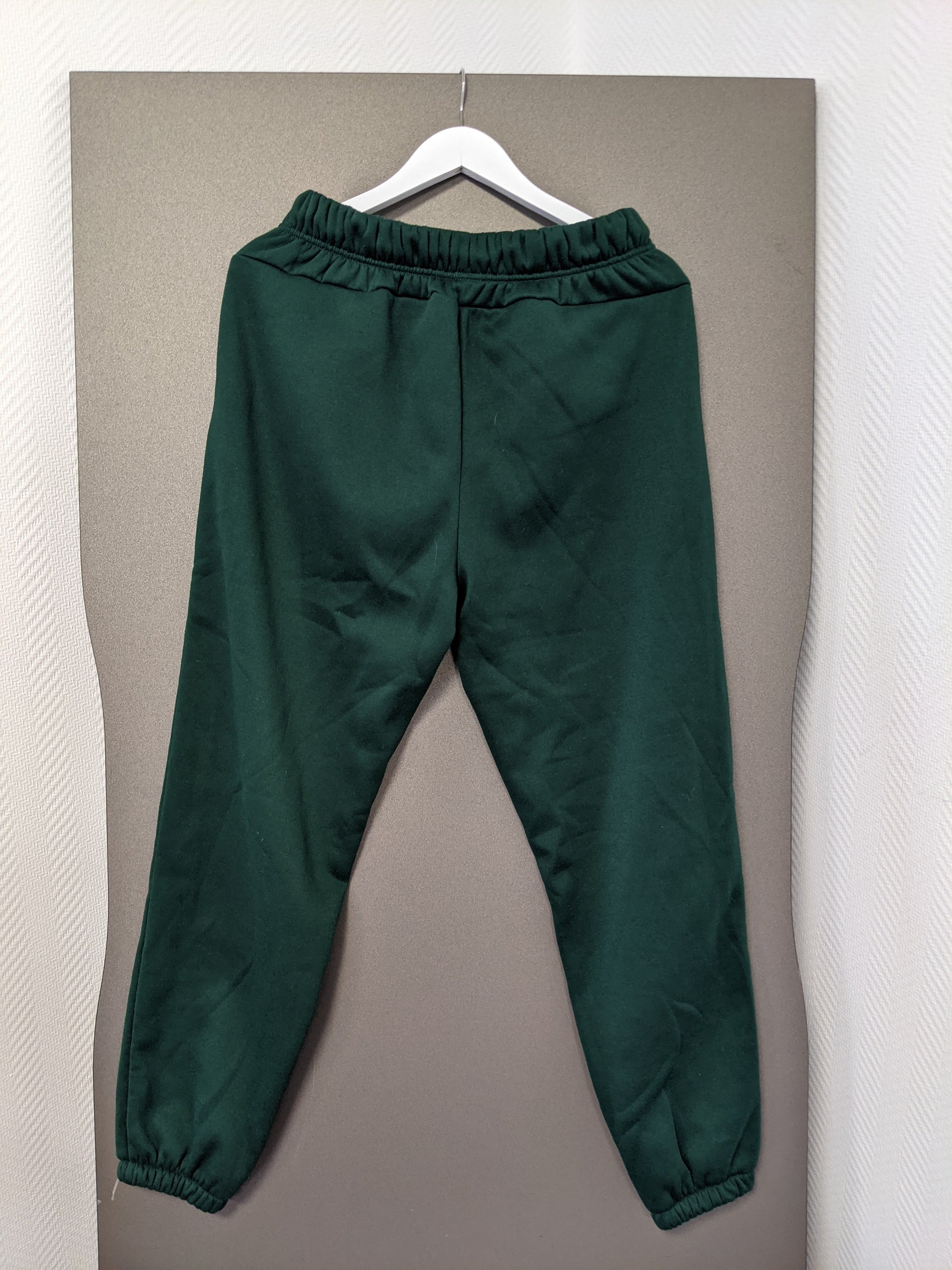Back view of green sweatpants