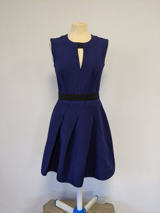 Front view of navy blue dress by Atos Lombardini