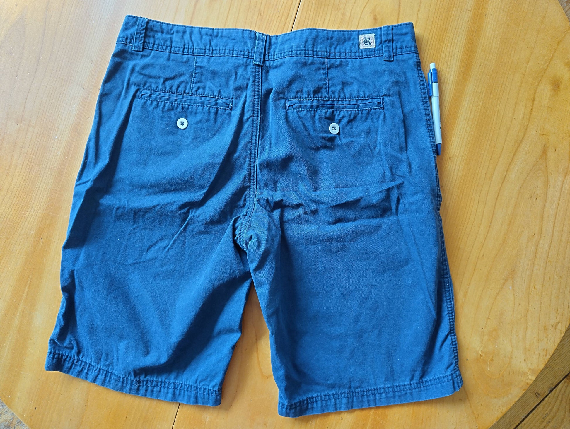 Back view of dark blue shorts