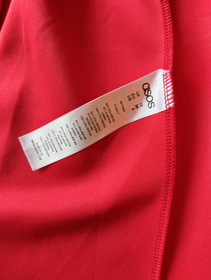 Close-up of ASOS tag and fabric details