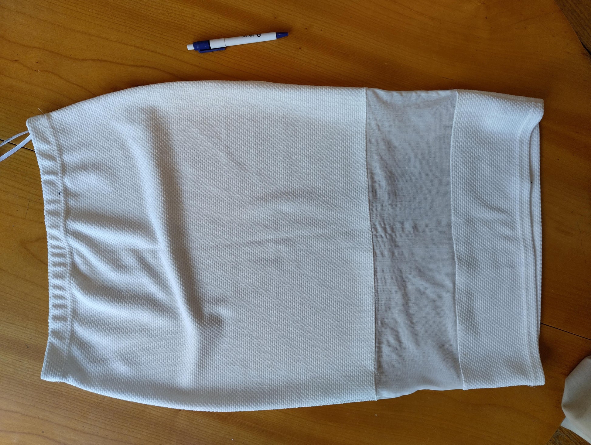 Skirt displayed flat showing fabric texture