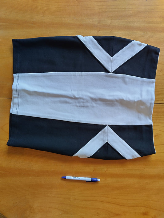 Black and white skirt on wooden table