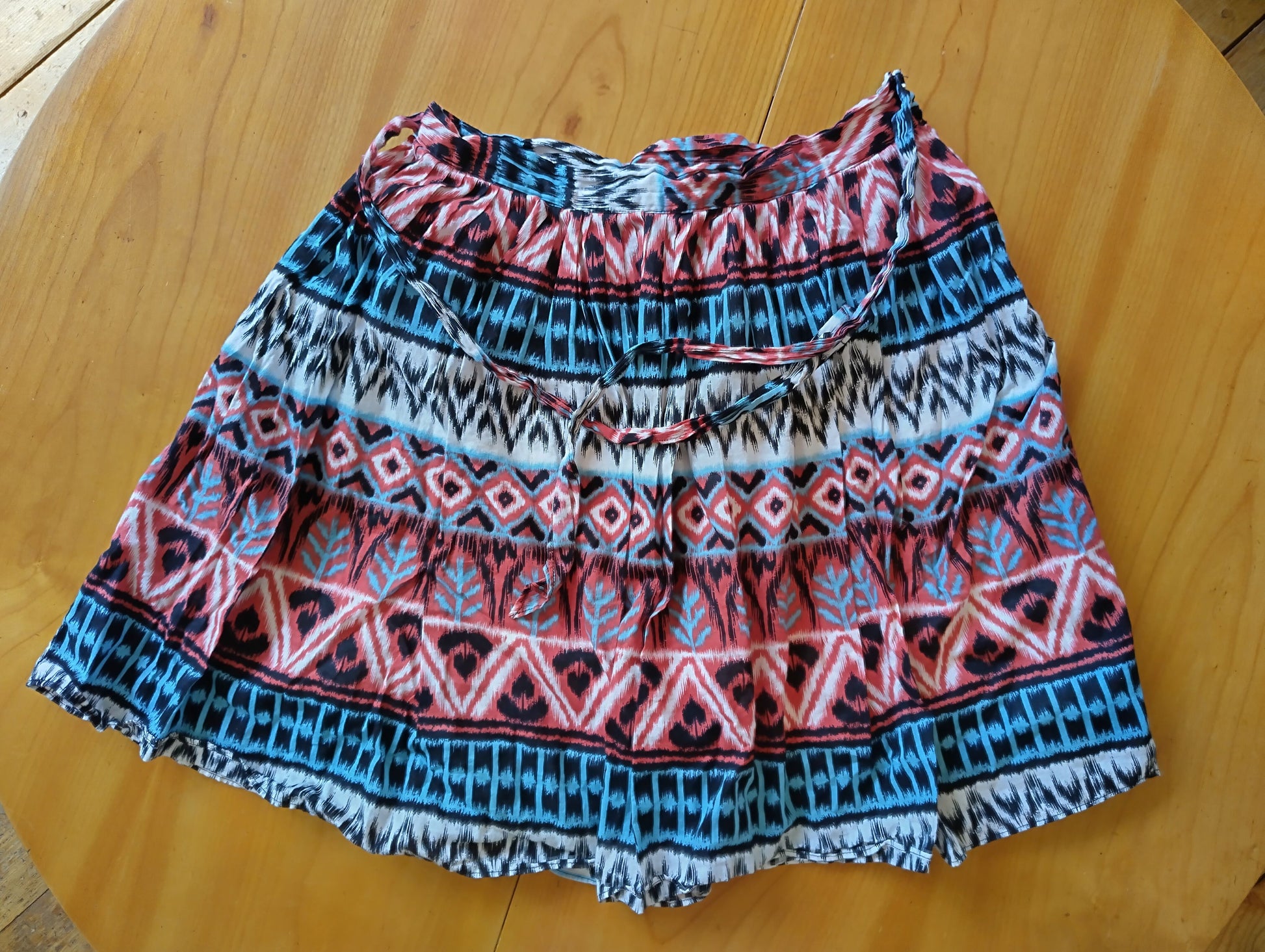 Colorful bohemian skater skirt on a table