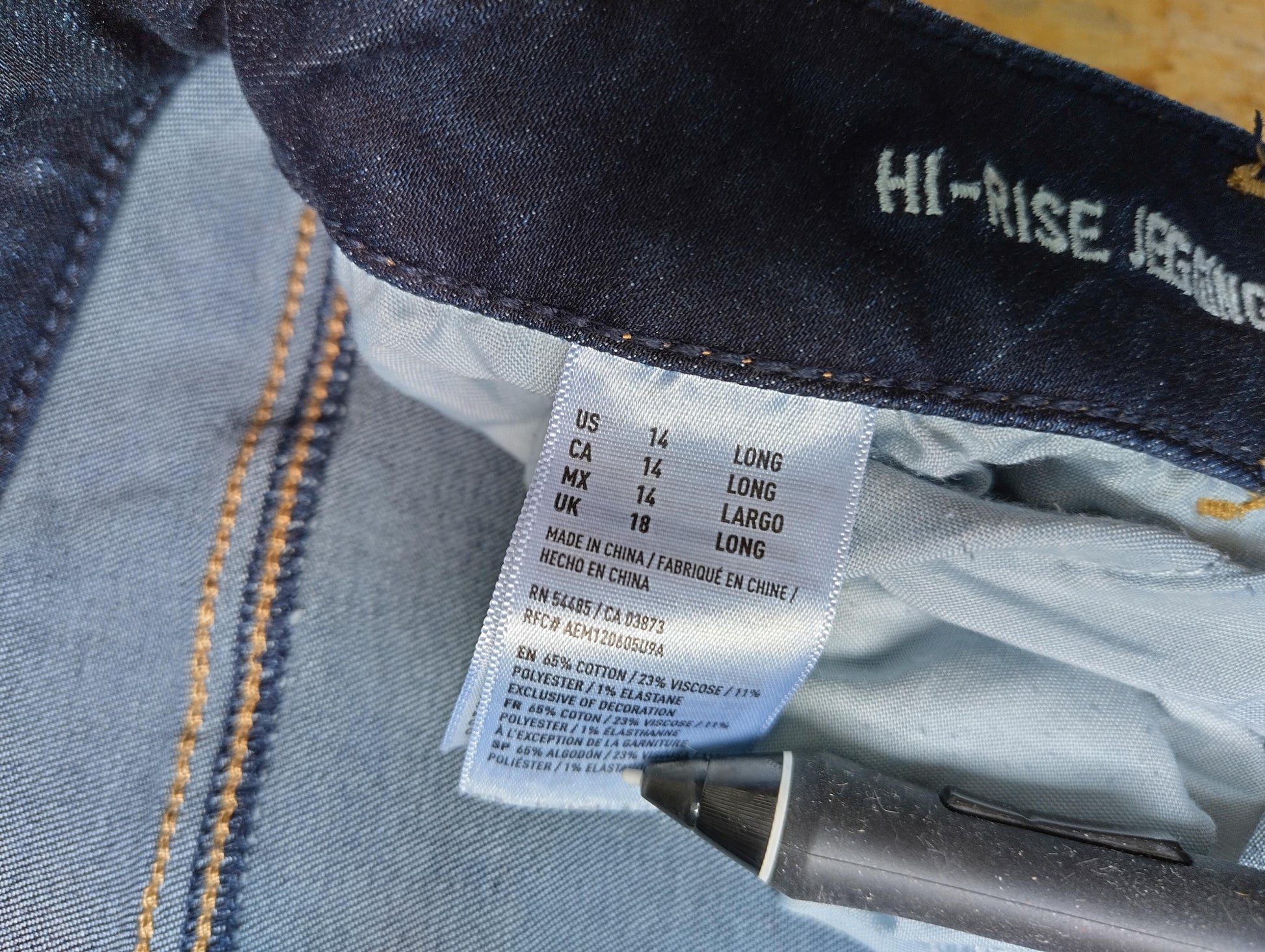 Label showing size 14 Long of jeans